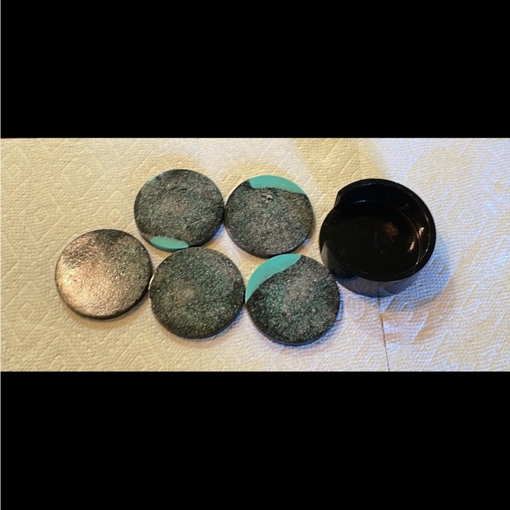 Two different sided epoxy homemade coasters made with paint